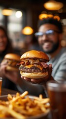 Friends enjoying a gourmet burger with crispy bacon, caramelized onions, and melted cheese. Perfect for World Hamburger Day celebrations.