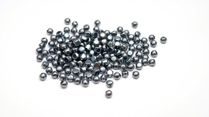 A cluster of rounded hematite beads scattered randomly across a pure white surface, showcasing their unique iridescent sheen, crystal clusters, mineral composition, natural material