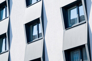 Modern facade with windows. Striped design.