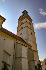 Cathedral of the Nativity of the Blessed Virgin Mary in Żywiec – a temple built in the fifteenth century with a high tower with a clock on it © Pawel Filusz
