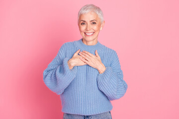 Photo portrait of attractive senior lady touch chest heart grateful dressed stylish blue knitwear...