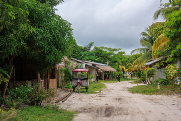 Streets and houses in the Peruvian jungle, in the community of Independencia in Iquitos, Peru.