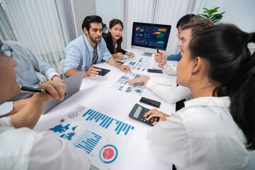 Diverse corporate audit team or company bookkeeper and accountant consultant calculate account...