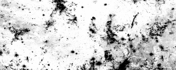 Fototapeta premium Abstract black and white grunge texture featuring splatters, scratches, and stains. Distress concrete wall dust and noise scratches on a black background. dust overlay distress grain. 