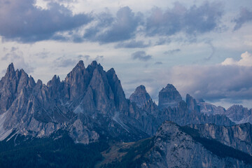 Obraz premium Aerial view of the Dolomites. Mountain landscape from above. Rocky peaks and mountain summits in the Alps scenic aerial view