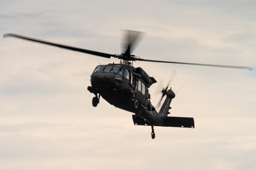 A Sikorsky UH-60 Black Hawk four-blade, twin-engine, medium-lift utility military helicopter manufactured by Sikorsky Aircraft. 