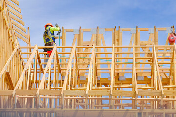 Construction on New Home or Residential Building Wooden Beams and Sky