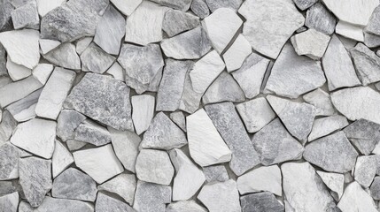 Obraz premium Seamless white and gray stone concrete texture for wall wallpaper showcasing a panoramic view of irregularly shaped stone pieces in a cohesive pattern