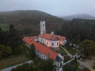 Obraz premium White Church in the Mountains - Aerial View from Drone, Frushka Mountain Serbia