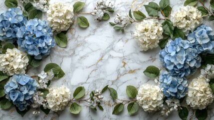 A floral arrangement featuring blue and white hydrangeas on a marble background.