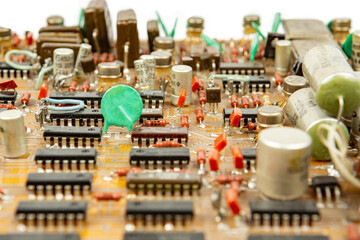 Parts and components on printed circuit boards close-up Electronic board with radio parts from electronic device.