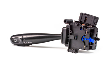 Close-up. Switches the direction indicator switch lever, also turns on the lighting, selective focus. Road safety