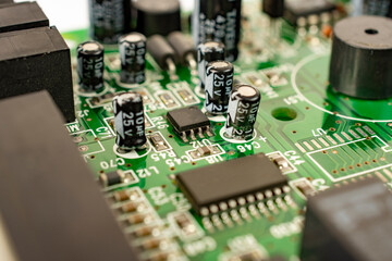 Close-up of a circuit board with microcircuits from an electrical appliance or computer. Selective...