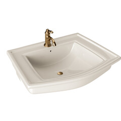 A white sink with a gold faucet and a gold handle