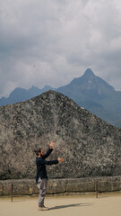 person on top of mountain