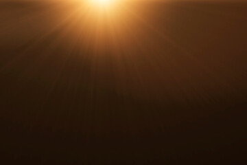 orange spotlight effect or crepuscular rays isolated on black background	