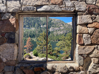Castle window with view to lake and trees