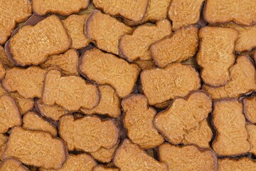 Tasty speculoos or speculaas with milk chocolate. Background of delicious cookies.