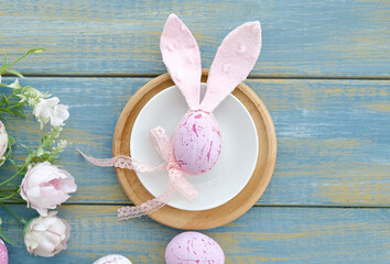 Easter background. Colorful spring tulips with butterflies