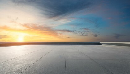 Creative concrete exhibition space with empty mock up place and sunset sky background. Creativity...