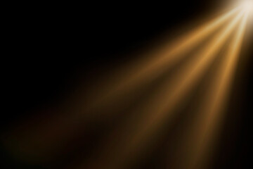 orange spotlight effect or crepuscular rays isolated on black background