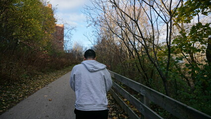 Man Observing Autumn Forest in Wisconsin