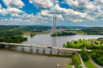 Naklejka premium Large thermal Kingston power plant in Roane County near Kingston, Tennessee. Coal used as fossil fuel for electric energy production in American grid