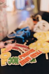 Photo booth gadgets, captions for photos, wedding attractions, party attractions, signs on sticks, funny photos,
