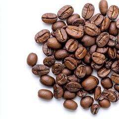 Fototapeta premium A photostock of a pile of roasted coffee beans scattered on a white surface, ideal for coffee shop themes. High Quality