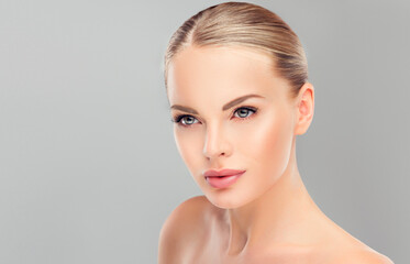 Beautiful Young Woman with Clean Fresh Skin close up . Skin care face . Cosmetology
