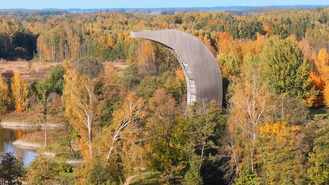 Amazing aerial view of Kirkilai karst lakes and lookout tower in the bright sunny autumn morning, Birzai eldership, Panevezys county, Lithuania