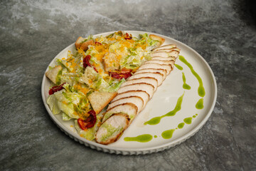 Caesar salad with chicken and egg yolk Bottarga