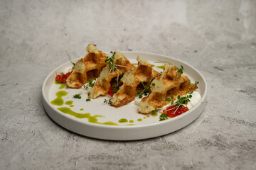 Potato pancakes with sour cream and red caviar