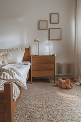 Blank white posters wood frames mockup on a wall, kid&rsquo;s room, mid century, wooden bed, dresser, toys