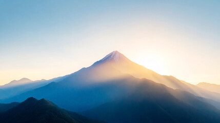 Majestic snow-capped mountain peak illuminated by golden sunlight at sunrise, showcasing nature's grandeur
