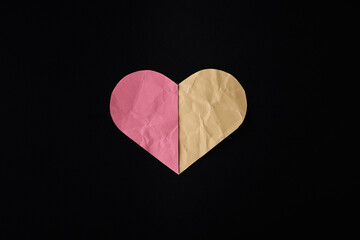 Pink & beige Paper heart on black background