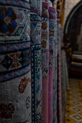 Handmade rugs display in a shop in Tangier, Morocco