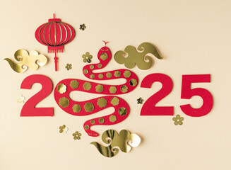 Chinese new year, year of the snake, year 2025 with snake in red and gold colors.