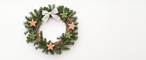 Holiday wreath with stars and bow on a white background. Vintage handmade Christmas wreath.