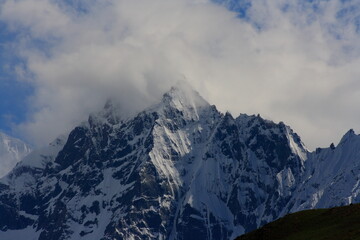 Mountains peaks, lost in clouds
