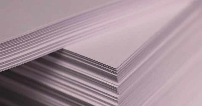 white blank sheets of paper are used for printing or writing, close-up of a piece of new pulp paper