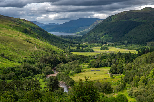 Corrieshalloch Gorge National Nature Reserve With River Through Pasture Valley And Loch Broom In Scotland, UK