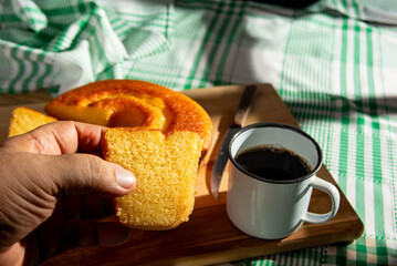 Orange cake, a beautiful sunny breakfast table and delicious Orange cake, selective focus.