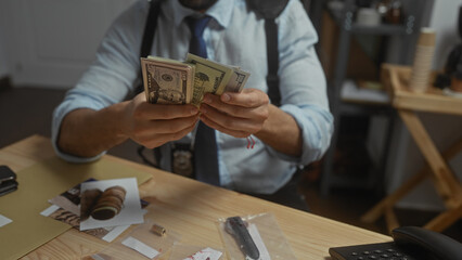 Fototapeta premium A man examines currency in a detective's office, surrounded by clues, conveying a sense of investigation.