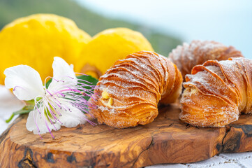 Italian desssert, Naples sfogliatella, shell-shaped layered pastry, with sweet custard-like filling made with semolina, ricotta, and candied citrus fruit
