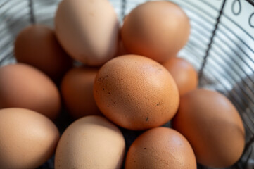 Organic brown chicken eggs from free-range organic farm in basket