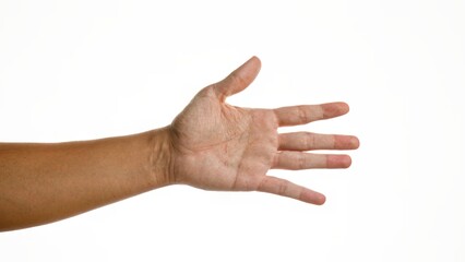 Man's hand with extended fingers isolated against a white background wall.