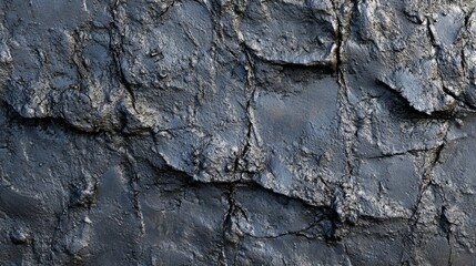 Fototapeta premium Rustic metal texture of deformed or ribbed steel bars used as reinforcement in concrete structures. Close-up view of the rough and rugged surface of rebar, showcasing its strength