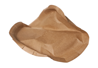 Crumpled cardboard disposable plate, isolated on white, eco friendly, clipping path