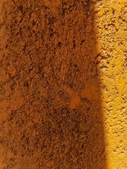 Textured yellow cement surface